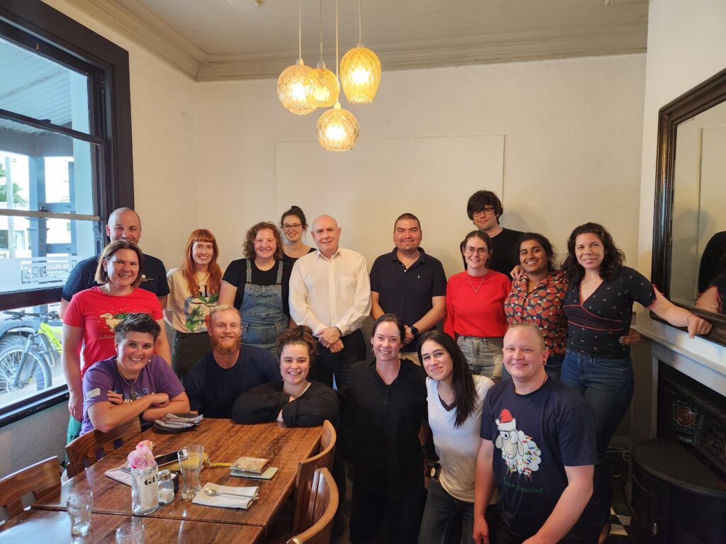 Christmas dinner function at Ombrello's restaurant, December 2022. From left to right, at the back: Joanne Gillum, Gert-Jan jeunen, Gracie Kroos, Hayley Quertermous, Chloé van der Burg, Neil Gemmell, Benjamín Durán-Vinet, Jessica Moffitt, William Pearman, Kristen Fernandes, Sara Ferreira. Front: Alana Alexander, Kaj Kamstra, Jonika Edgecombe, Michelle Liddy, Allison Miller, Jackson Treece. 