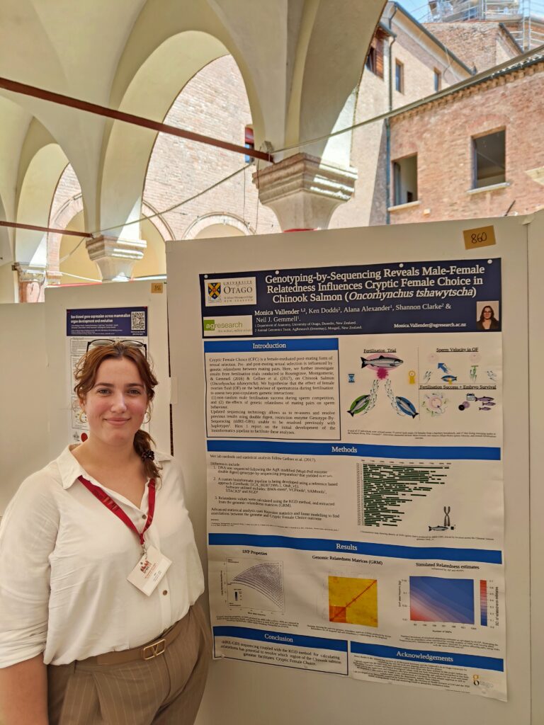 Monica by her poster at a conference in July 2023.